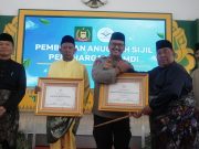 Kapolres Langkat Terima Penghargaan Tokoh Inspiratif dari Dunia Melayu Dunia Islam